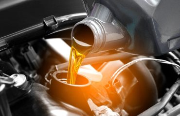 Pouring oil into car components