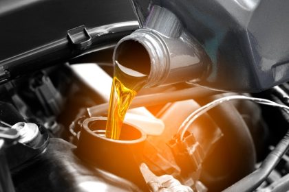 Pouring oil into car components