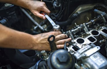 mechanic working on car