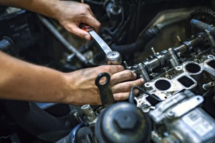 mechanic working on car