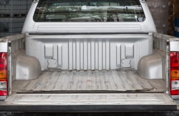 View into a silver pickup truck bed