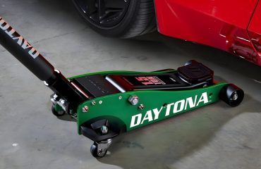 Floor jack next to car