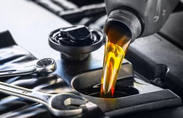 pouring engine oil