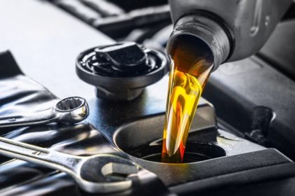 pouring engine oil