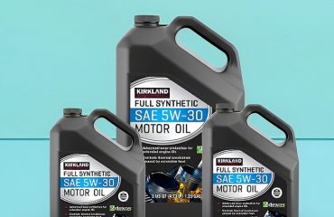 Motor oil bottles on blue background