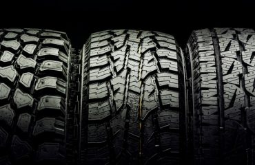 Three all-terrain tires in a row