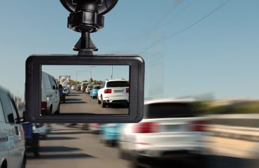 Dashcam attached to car windshield